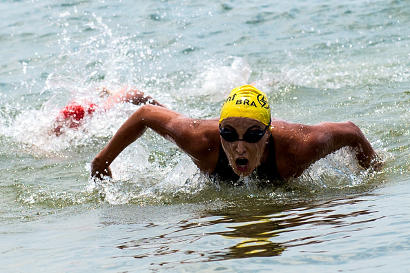 RIO DE JANEIRO, BRAZIL - DECEMBER 13: Poliana Okimoto of Brazil in action on the course at Copacabana Beach during the King and Queen of the Sea 2015 on December 13, 2015 in Rio de Janeiro, Brazil. (Photo by Buda Mendes/Getty Images)