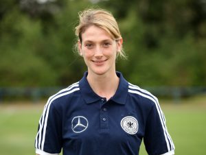 KUEHLUNGSBORN, GERMANY - SEPTEMBER 05: Chef Mona Nemmer poses during the U21 Germany Team Presentation on September 5, 2012 in Kuehlungsborn, Germany. (Photo by Matthias Kern/Bongarts/Getty Images)