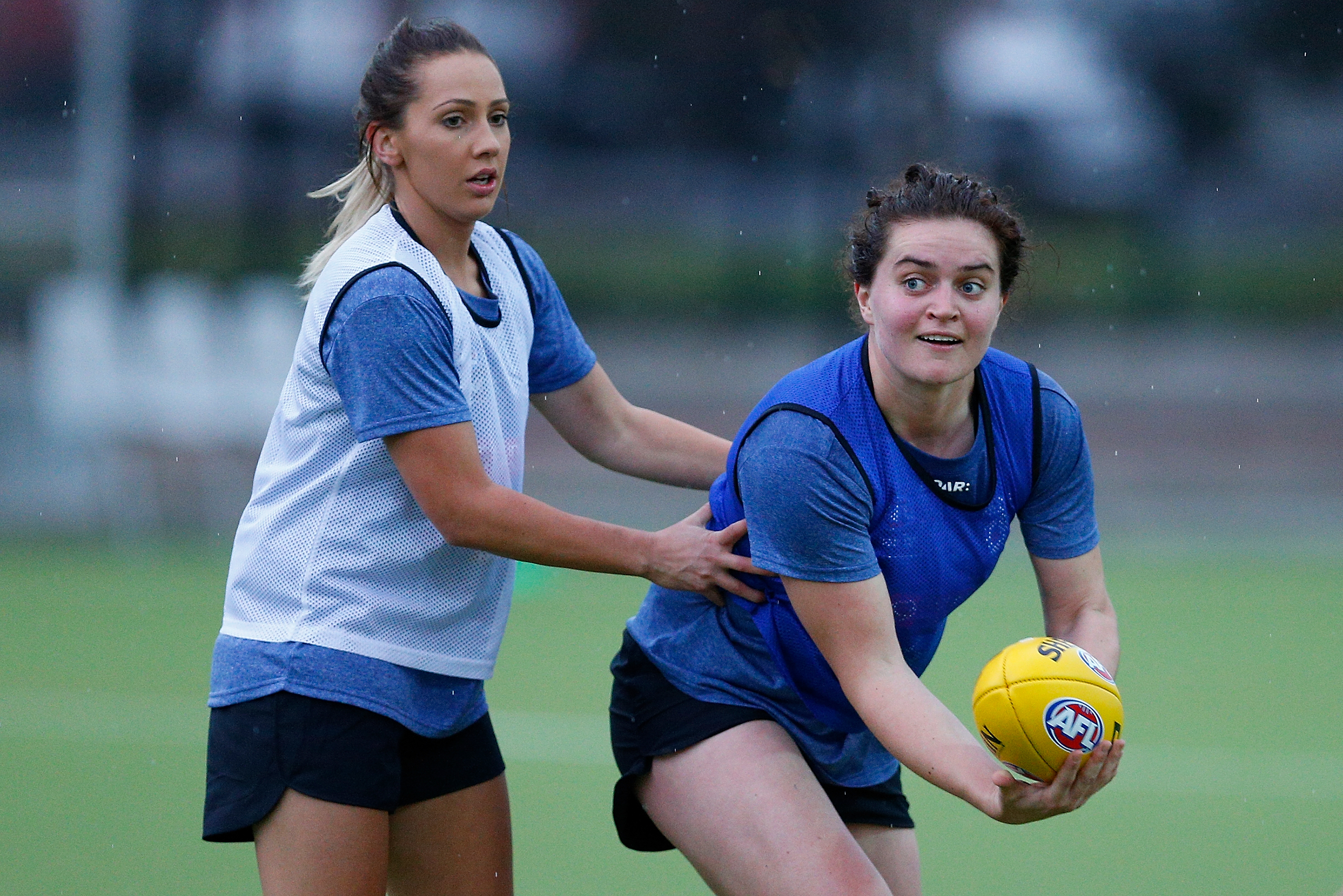 MELBOURNE, AUSTRALIA - NOVEMBER 22: Laura Bailey (L) and Meg McDonald (R) in action during the Western Bulldogs women's AFL training session at Maribyrnong College on November 22, 2016 in Melbourne, Australia. (Photo by Daniel Pockett/AFL Media/Getty Images)