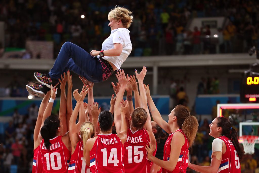 RIO DE JANEIRO, BRAZIL - AUGUST 20: Serbia throws their head coach Marina Maljkovic into the air in celebration after defeating France 70-63 in the Women's Bronze Medal basketball game on Day 15 of the Rio 2016 Olympic Games at Carioca Arena 1 on August 20, 2016 in Rio de Janeiro, Brazil. (Photo by Tom Pennington/Getty Images)