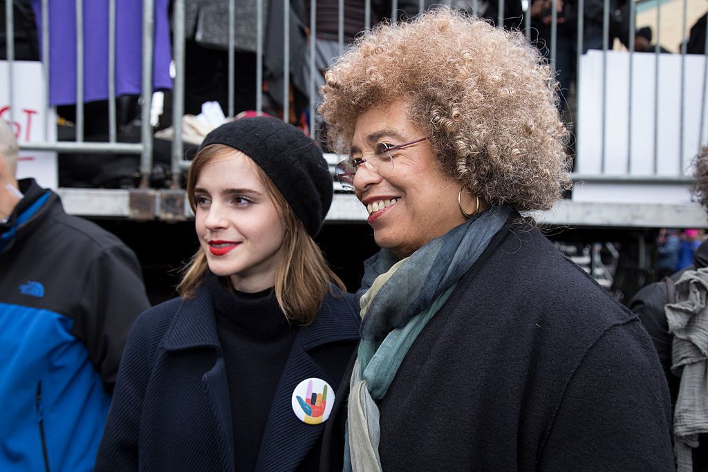WASHINGTON, DC - JANUARY 21: Emma Watson (L) and Angela Davis attends the rally at the Women's March on Washington on January 21, 2017 in Washington, DC. (Photo by Brian Stukes/WireImage)