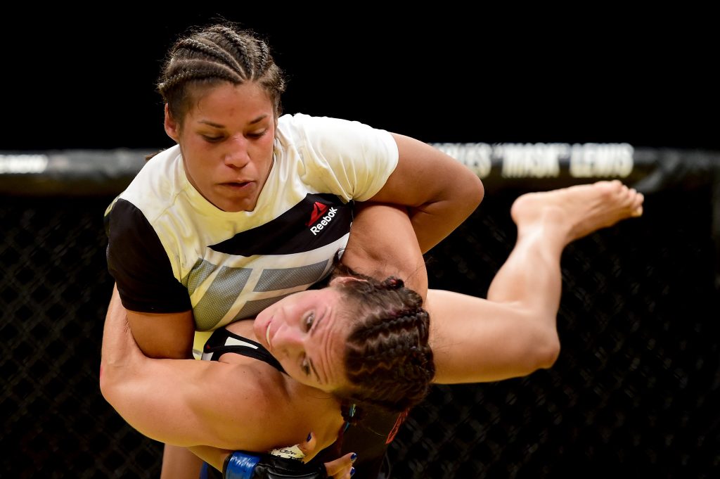 LAS VEGAS, NV - JULY 09: Cat Zingano (bottom) wrestles with Julianna Pena in their women's bantamweight bout during the UFC 200 event on July 9, 2016 at T-Mobile Arena in Las Vegas, Nevada. (Photo by Harry How/Zuffa LLC/Zuffa LLC via Getty Images)