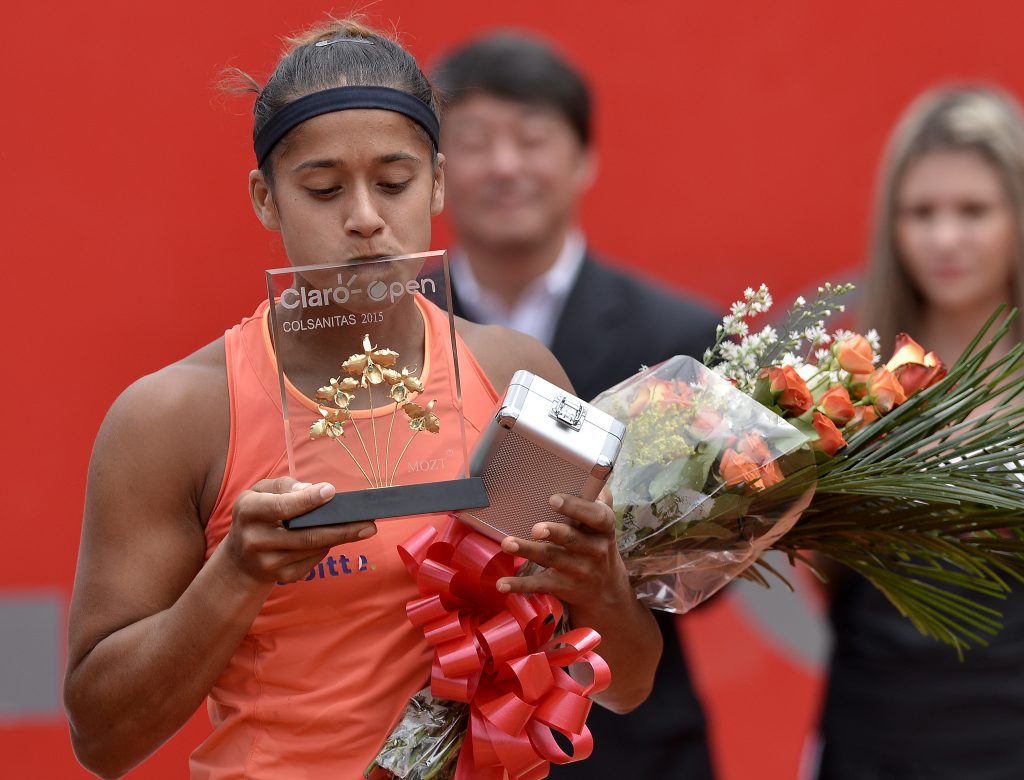 BOGOTA, COLOMBIA - APRIL 19: Teliana Pereira of Brazil kisses the trophy after winning a singles final match between Yaroslava Shvedova and Teliana Pereira as part of Claro Open Colsanitas WTA 2015 at El rancho Club on April 19, 2015 in Bogota, Colombia. (Photo by Gabriel Aponte/Vizzor/LatinContent/Getty Images)