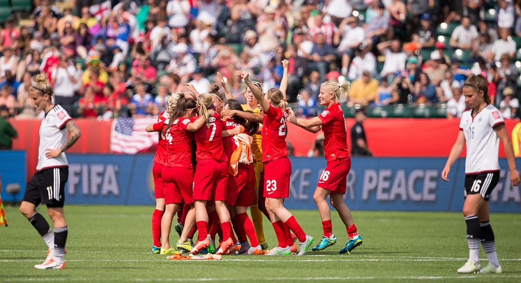 England's players celebrate their 1-0 win over Germany in the bronze medal match against Germany at the FIFA Women's World Cup in Edmonton, Canada on July 4, 2015. AFP PHOTO/GEOFF ROBINS (Photo credit should read GEOFF ROBINS/AFP/Getty Images)