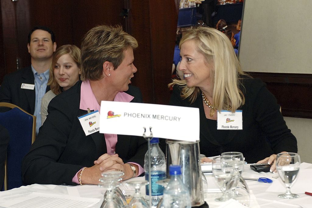 NEW YORK - OCTOBER 26: Phoenix Mercury Vice President Ann Myers (L) and COO Jay Parry (R) celebrate their team's success at the 2007 WNBA Draft Lottery on October 26, 2006 in New York City. NOTE TO USER: User expressly acknowledges and agrees that, by downloading and/or using this Photograph, user is consenting to the terms and conditions of the Getty Images License Agreement. Mandatory Copyright Notice: Copyright 2006 NBAE (Photo by Jennifer Pottheiser/NBAE via Getty Images)