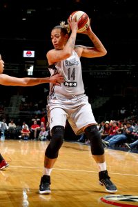 WASHINGTON, DC - MAY 14: Erika de Souza #14 of the San Antonio Stars handles the ball against the Washington Mystics on May 14, 2017 at Verizon Center in Washington, DC. NOTE TO USER: User expressly acknowledges and agrees that, by downloading and or using this Photograph, user is consenting to the terms and conditions of the Getty Images License Agreement. Mandatory Copyright Notice: Copyright 2017 NBAE (Photo by Ned Dishman/NBAE via Getty Images)