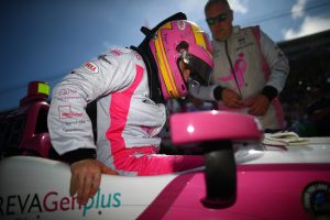 INDIANAPOLIS, IN - MAY 27: Pippa Mann of Great Britian, driver of the #63 Susan G. Komen Dale Coyne Racing Honda, prepares to drive on Carb Day ahead of the 100th running of the Indianapolis 500 at Indianapolis Motorspeedway on May 27, 2016 in Indianapolis, Indiana. (Photo by Chris Graythen/Getty Images)