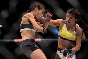 LAS VEGAS, NV - JULY 8: Claudia Gadelha throws a punch against Joanna Jedrzejczyk during The Ultimate Fighter Finale at MGM Grand Garden Arena on July 8, 2016 in Las Vegas, Nevada. (Photo by Cooper Neill/Zuffa LLC/Zuffa LLC via Getty Images)