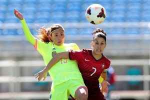 FARO, PORTUGAL - MARCH 06: Megumi Takase of Japan challenges Claudia Neto of Portugal during the Women's Algarve Cup match between Japan and Portugal on March 6, 2015 in Faro, Portugal. (Photo by Filipe Farinha/Getty Images)