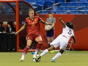 MONTREAL, QC - JUNE 09: Diana Saenz #5 of Costa Rica challenges Jennifer Hermoso #10 of Spain during the 2015 FIFA Women's World Cup Group E match at Olympic Stadium on June 9, 2015 in Montreal, Quebec, Canada. The final score between Spain and Costa Rica 1-1. (Photo by Minas Panagiotakis/Getty Images)